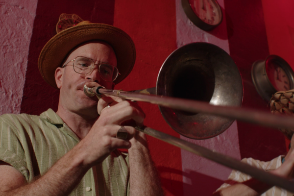 Low-angle shot of trombonist Charlie Halloran